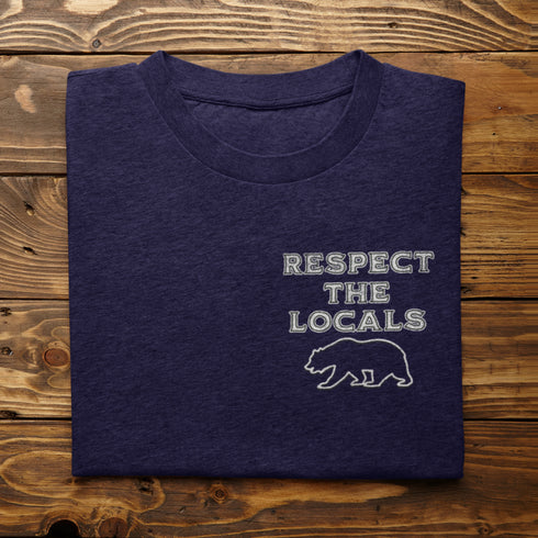 Introducing our latest camping t-shirt featuring a bear graphic and the empowering slogan "Respect The Locals".